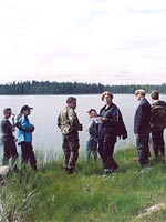July 2003. Vazhenvaara. The members of the expedition at the place where the remnants of the 44th division returned to the Soviet territory