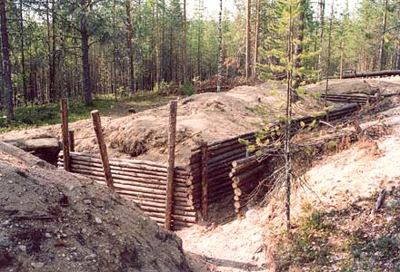 Heinäkuu 2003. Kalevalan (Uhtuan) piiri. Suomen joukkojen ennallistetut asemat Kis-Kisin alueella 18 kilometrin päässä Kalevalan taajamasta